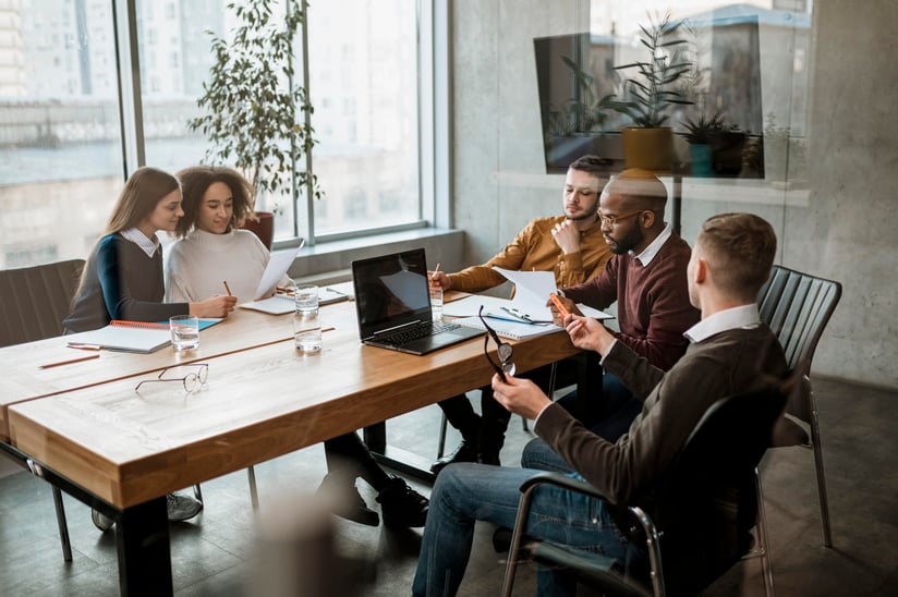 front-view-people-having-meeting-office (1)